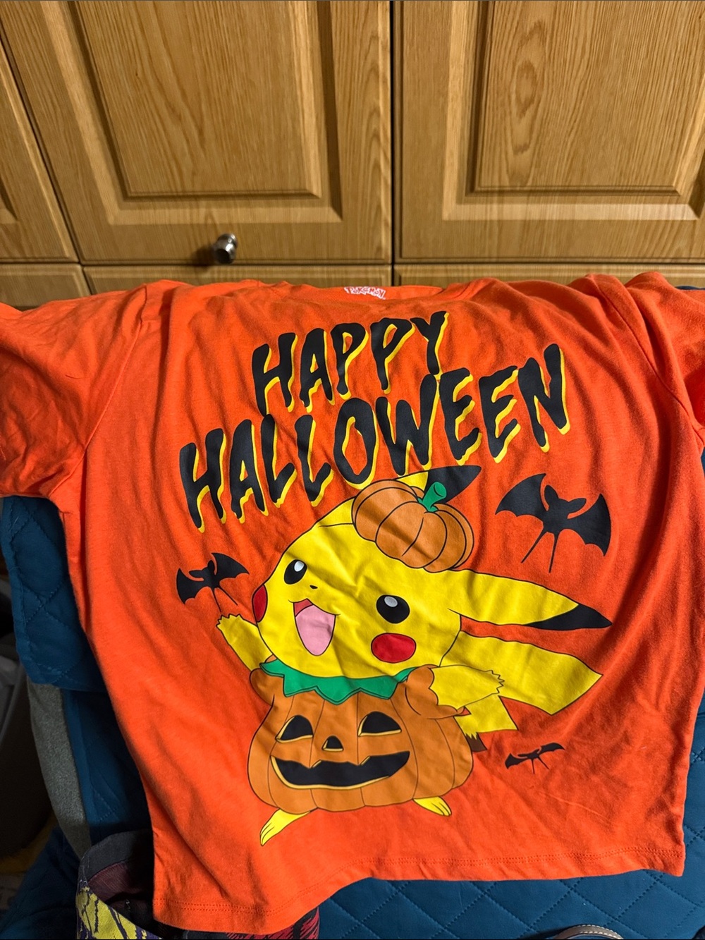 Pokemon Orange Pikachu Halloween Tee with Pumpkin Graphic